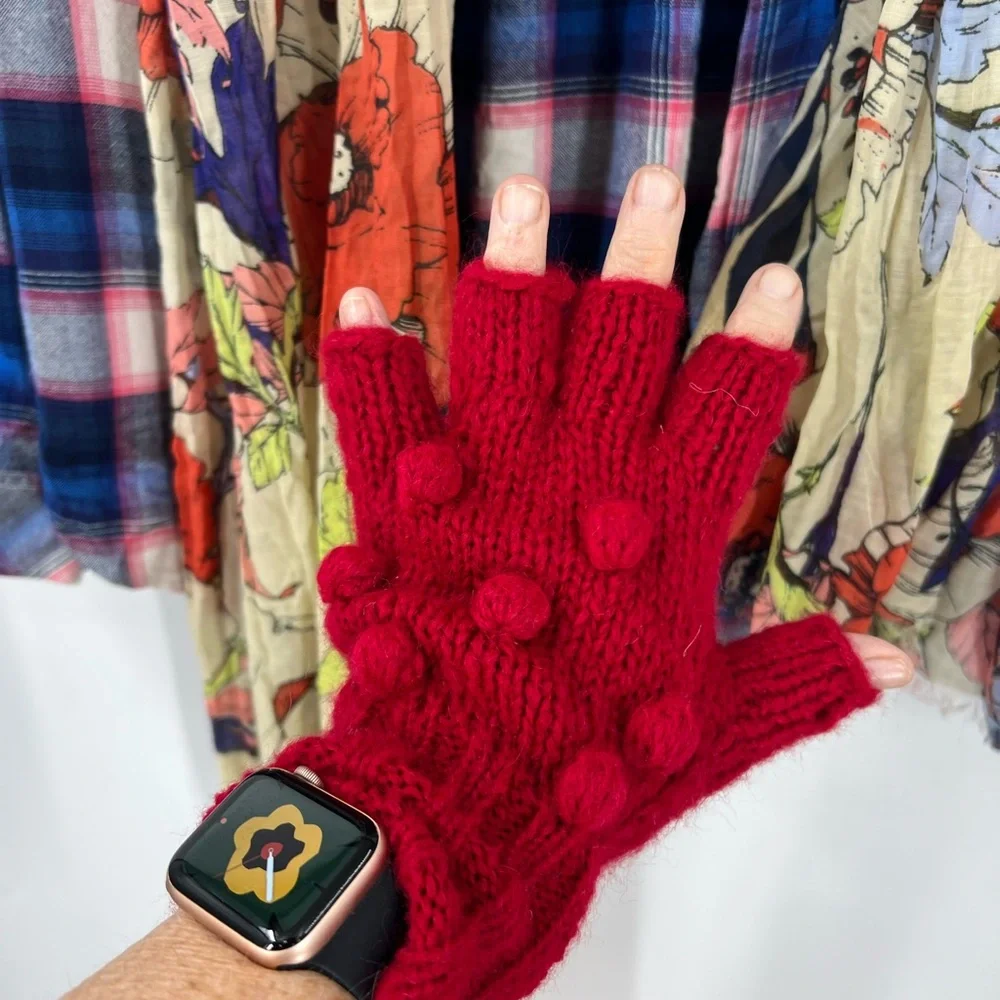 Wooden ships popcorn, fingerless glove with red raised Swiss dot bobble
